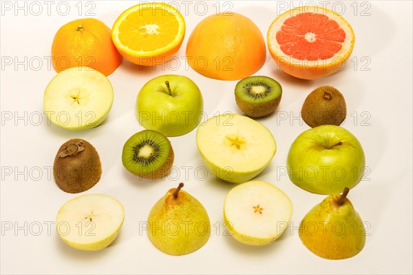 Fresh fruit cut in half. citrus fruits, lime, lemon, orange, grapefruit isolated on white background