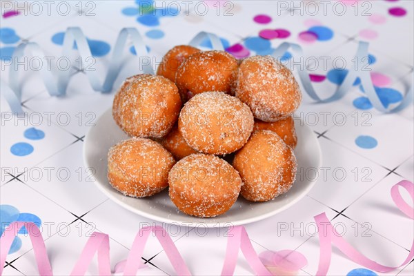 German traditional 'Berliner Pfannkuchen', a donut without hole filled with jam traditional served during carnival