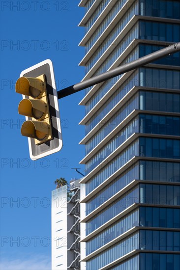 Traffic light in a modern financial district in Barcelona in Spain