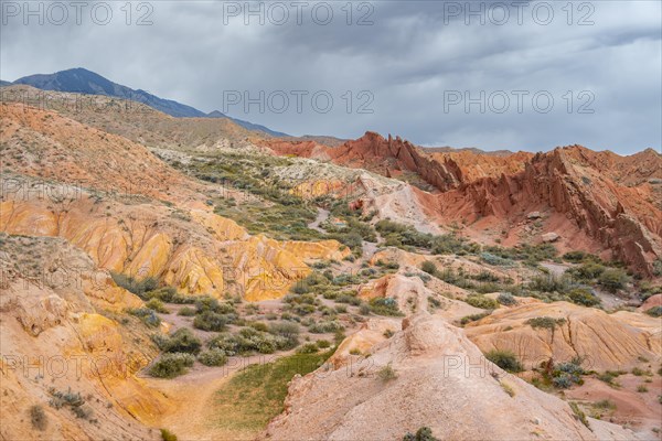 Eroded mountain landscape, sandstone cliffs, canyon with red and orange rock formations, Konorchek Canyon, Chuy, Kyrgyzstan, Asia