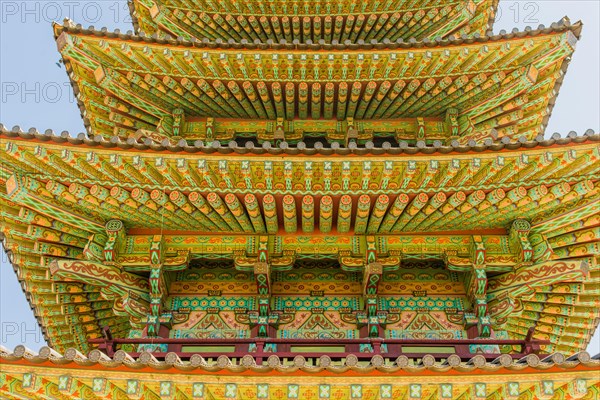 Buyeo, South Korea, July 7, 2018: Eves of colorful Buddhist five story pagoda at Neungsa Baekje Temple, Asia