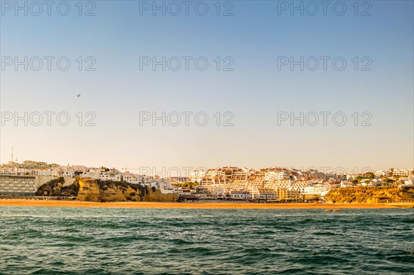 Albufeira with Fishermen Beach seen from the water, Algarve, south of Portugal