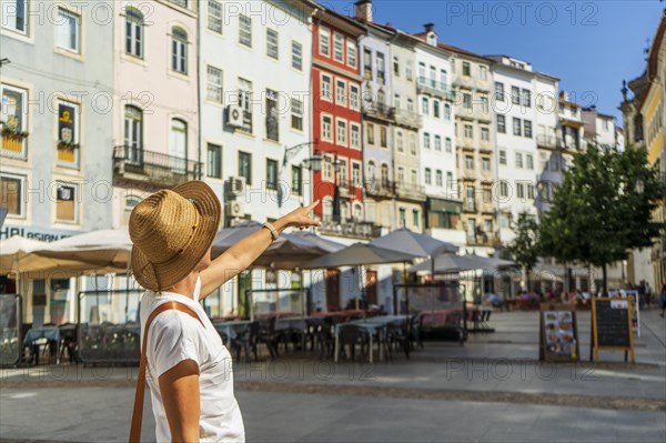 Woman sightseeing beautiful town, Coimbra, Portugal, Europe