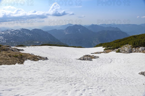 Amazing mountains panorama from 5 Fingers viewing platform in the shape of a hand with five fingers on Mount Krippenstein in the Dachstein Mountains of Upper Austria, Salzkammergut region, Austria, Europe