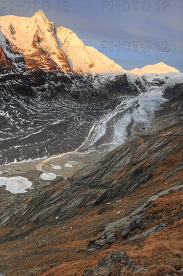 Glacier tongue in front of a mountain peak at sunrise, autumn, Pasterze and Grossglockner, Hohe Tauern National Park, Austria, Europe