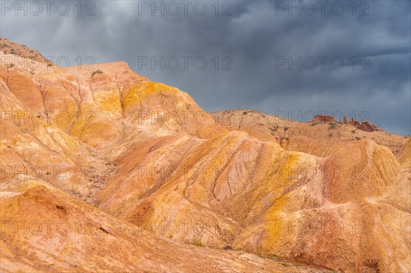 Eroded mountain landscape, sandstone cliffs, canyon with red and orange rock formations, Konorchek Canyon, Chuy, Kyrgyzstan, Asia