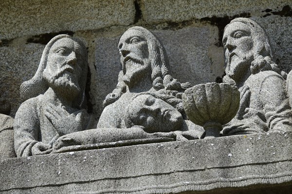 Stone relief detail of the Last Supper, Calvary Calvaire, enclosed parish of Enclos Paroissial de Pleyben from the 15th to 17th century, Finistere department, Brittany region, France, Europe