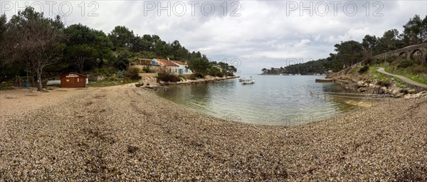 Pebble beach in a bay, panoramic view, near Mali Losinj, Kvarner Gulf Bay, Croatia, Europe