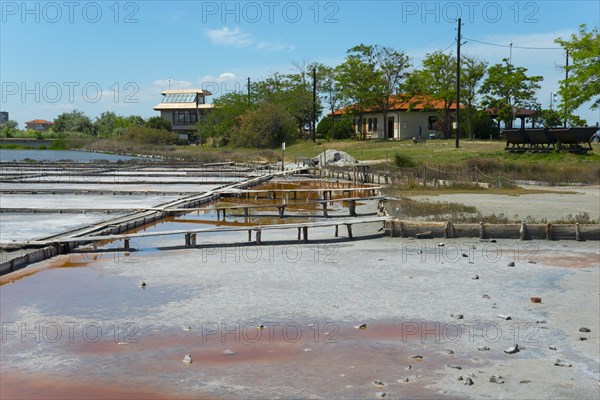 Salt extraction plant with natural landscape in the background and a clear blue sky, therapeutic mud and salt extraction, Salt Museum, Pomorie, Burgas, Bulgaria, Europe
