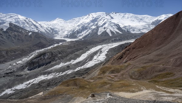 High mountain landscape with glacier moraines and glacier tongues, glaciated and snow-covered mountain peaks, Lenin Peak and Peak of the XIX Party Congress of the CPSU, Traveller's Pass, Trans Alay Mountains, Pamir Mountains, Osh Province, Kyrgyzstan, Asia