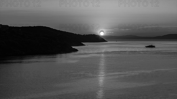 Sunrise in the Baia di Mola bay off Porto Azzurro, black and white photo, Elba, Tuscan Archipelago, Tuscany, Italy, Europe