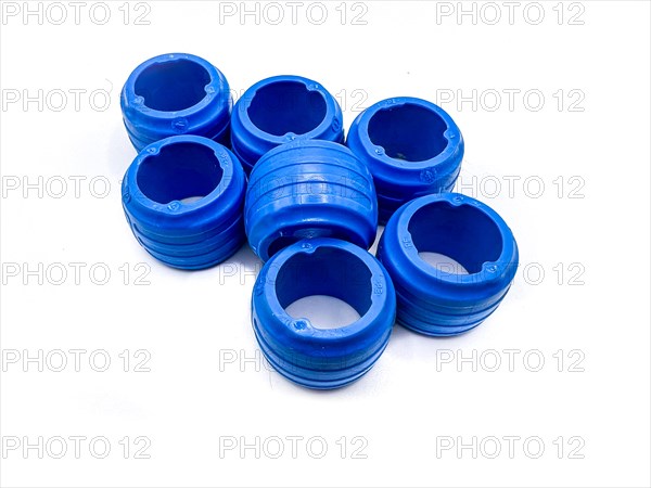 Blue hydraulic and pneumatic O-rings isolated on white background. PEX rings. Sealing gaskets for hydraulic seals. Rubber sealing gaskets for plumbing