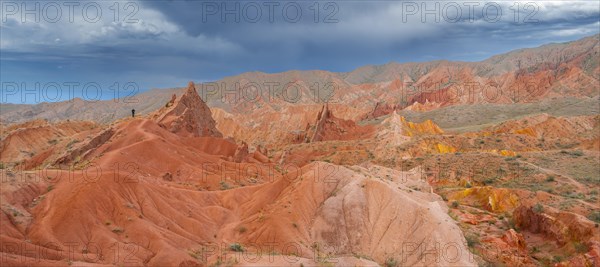 Eroded mountain landscape, sandstone cliffs, canyon with red and orange rock formations, Konorchek Canyon, Chuy, Kyrgyzstan, Asia