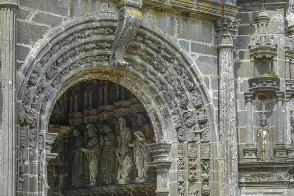 Side portal of the church, Enclos Paroissial parish of Guimiliau, Finistere Penn ar Bed department, Brittany Breizh region, France, Europe
