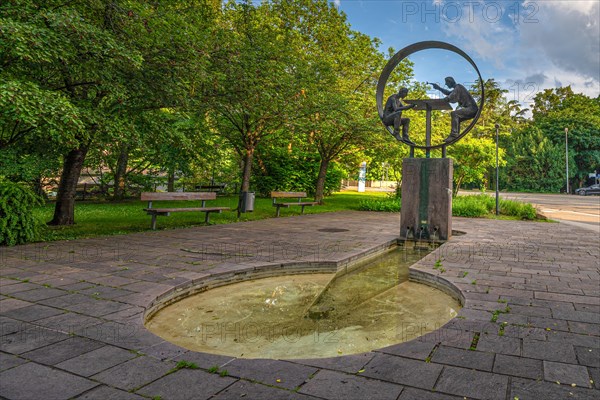 Water feature with sculpture in a green park, Pforzheim, Germany, Europe