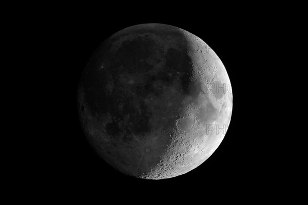 Waxing crescent moon seen with telescope