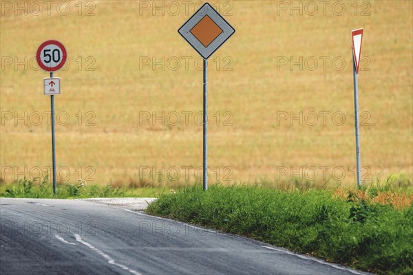 Traffic signs on a rural road with speed limit, Osterholz, Wuppertal, North Rhine-Westphalia, Germany, Europe