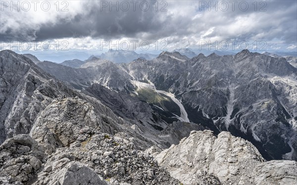 View of Wimbachgries valley and mountain panorama with rocky mountain peak of the Hochkalter, at the summit of the Watzmann Mittelspitze, Berchtesgaden National Park, Berchtesgaden Alps, Bavaria, Germany, Europe