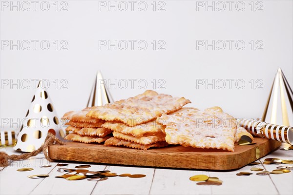 Fried Italian dessert snack for carnival season called 'Galani', ' Chiacchiere' or 'Crostoli' depending on region. Also known as Angel Wings pastry