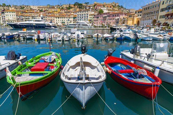 Fishing boats and luxury yachts in the harbour of Portoferraio, Elba, Tuscan Archipelago, Tuscany, Italy, Europe