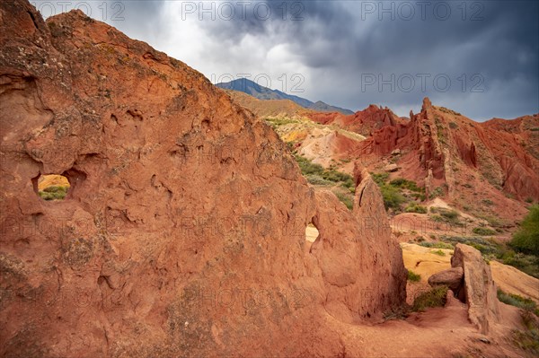 Eroded mountain landscape, sandstone cliffs, canyon with red and orange rock formations, Konorchek Canyon, Chuy, Kyrgyzstan, Asia