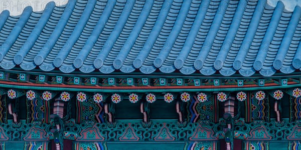 Seoul, South Korea, March 18, 2017:Tiled roof of Seoul's Gyeong Bok Gung Palace in stunning colors of green, blue, red and yellow, Asia