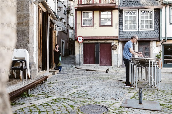 Porto, Portugal, April 17, 2023: Slow morning with people running their errands, Europe