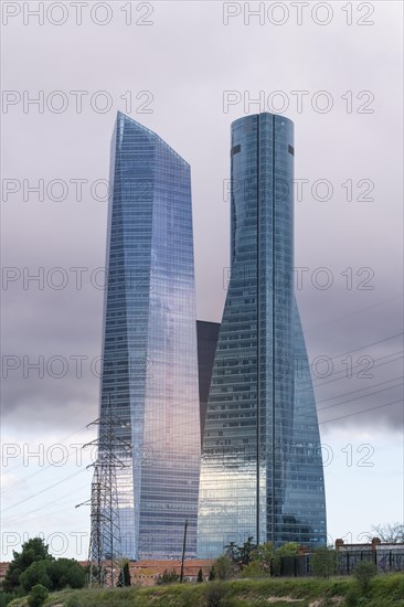 Office towers in the contemporary urban landscape in the Cuatro Torres financial area in the city of Madrid in Spain