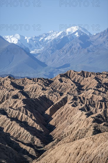 Canyons and eroded hilly landscape on mountains of the Tian Shan, Badlands, Valley of the Forgotten Rivers, near Bokonbayevo, Yssykkoel, Kyrgyzstan, Asia