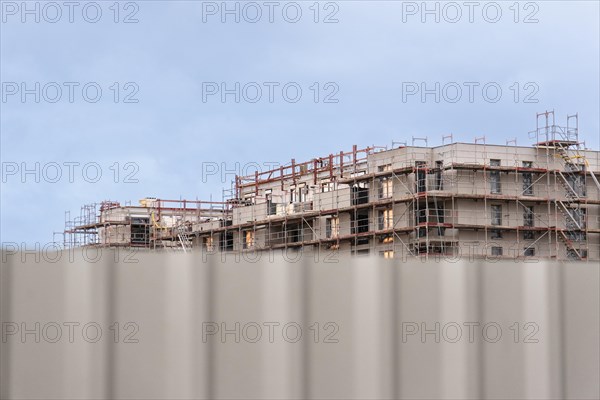 Scaffolding at the construction site of a new housing estate in Duesseldorf, Germany, Europe