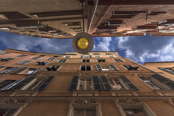 Tall apartment blocks in a small alley in the historic centre, Genoa, Italy, Europe