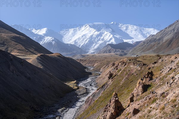 Valley with river Achik Tash between high mountains, mountain landscape with peak Pik Lenin, Osh province, Kyrgyzstan, Asia