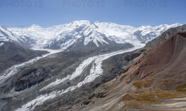 High mountain landscape with glacier moraines and glacier tongues, glaciated and snow-covered mountain peaks, Lenin Peak and Peak of the XIX Party Congress of the CPSU, Traveller's Pass, Trans Alay Mountains, Pamir Mountains, Osh Province, Kyrgyzstan, Asia