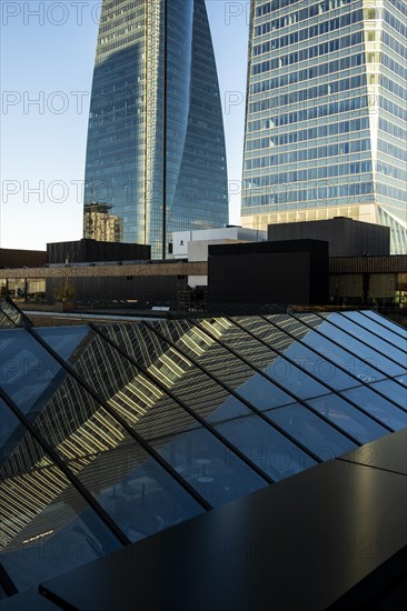 Office towers in the contemporary urban landscape in the Cuatro Torres financial area in the city of Madrid in Spain