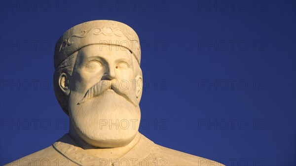 Statue of the resistance fighter and partisan Yannis Daskaloyannis, close-up of a statue of a historical figure in front of a clear blue sky, Anopolis, Sfakia, West Crete, Crete, Greece, Europe