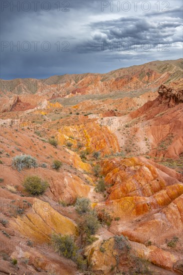 Eroded mountain landscape, sandstone cliffs, canyon with red and orange rock formations, Konorchek Canyon, Chuy, Kyrgyzstan, Asia