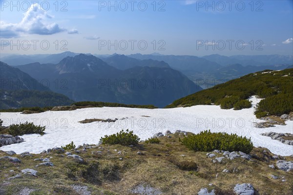 Amazing mountains panorama from 5 Fingers viewing platform in the shape of a hand with five fingers on Mount Krippenstein in the Dachstein Mountains of Upper Austria, Salzkammergut region, Austria, Europe