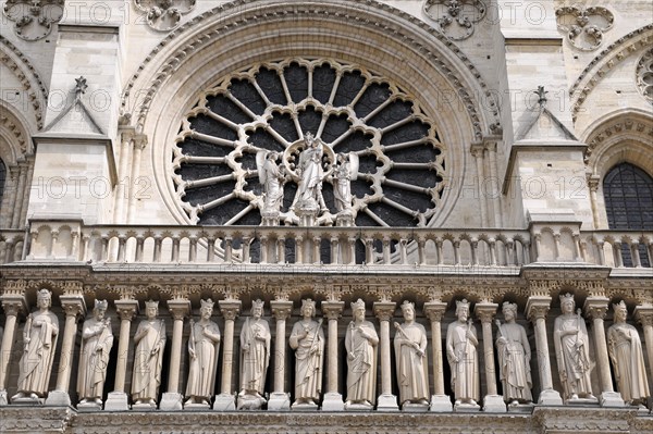Figures of saints, detail on the Gothic entrance portal of Notre Dame de Paris Cathedral, Paris, France, Europe