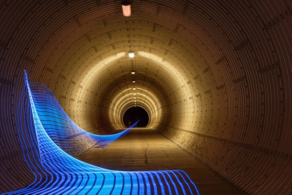 Light installation with blue lines in a tunnel, photographed with long exposure, Pforzheim, Germany, Europe