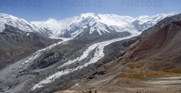 High mountain landscape with glacier moraines and glacier tongues, glaciated and snow-covered mountain peaks, Lenin Peak and Peak of the XIX Party Congress of the CPSU, Traveller's Pass, Trans Alay Mountains, Pamir Mountains, Osh Province, Kyrgyzstan, Asia