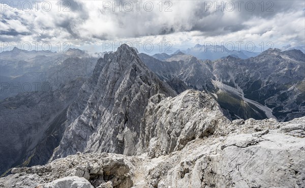 Rocky, narrow mountain ridge with Watzmann Suedspitze, view from Watzmann middle summit to mountain panorama with Wimbachgriestal and Steinernes Meer, Watzmann crossing, Berchtesgaden National Park, Berchtesgaden Alps, Bavaria, Germany, Europe