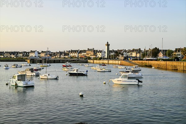 Old harbour with boats and lighthouse, Roscoff, Finistere, Brittany, France, Europe