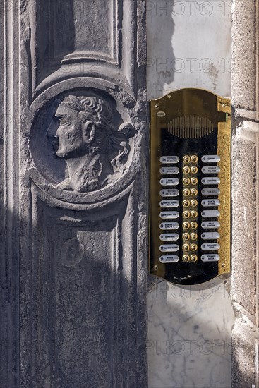 Relief of a bust of a Caesar on the entrance portal of a former palazzo, historic centre, Genoa, Italy, Europe