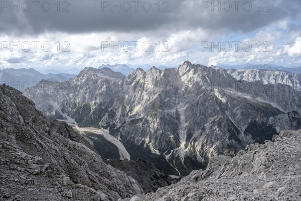 View of Wimbachgries valley and mountain panorama with rocky mountain peak of the Hochkalter, at the summit of the Watzmann Mittelspitze, Berchtesgaden National Park, Berchtesgaden Alps, Bavaria, Germany, Europe