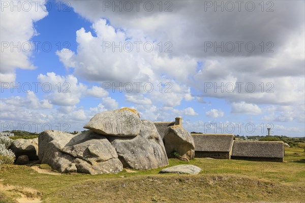 Former village of Meneham on the Atlantic coast with partly thatched houses between granite rocks, now an open-air museum, Menez Ham, Kerlouan, Finistere Penn ar Bed department, Brittany Breizh region, France, Europe