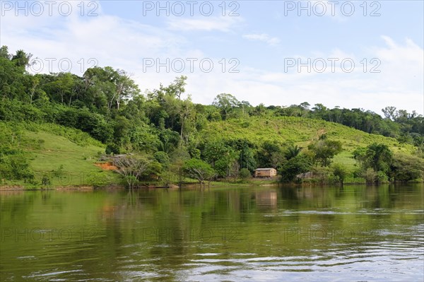 Wooden house on stilts along the Trombetas river, Para state, Brazil, South America