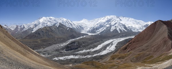 High mountain landscape with glacier moraines and glacier tongues, glaciated and snow-covered mountain peaks, Lenin Peak and Peak of the XIX Party Congress of the CPSU, Traveller's Pass, Trans Alay Mountains, Pamir Mountains, Osh Province, Kyrgyzstan, Asia