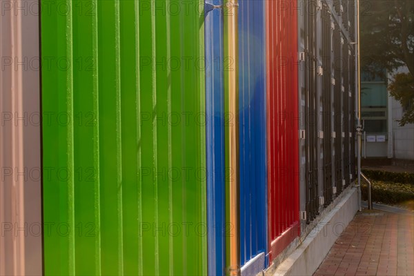 Exterior wall of building built to resemble metal shipping containers