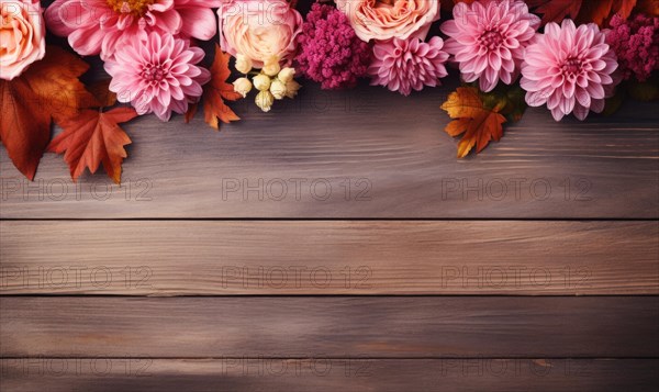 A romantic selection of soft pink fall flowers laid upon wooden planks AI generated