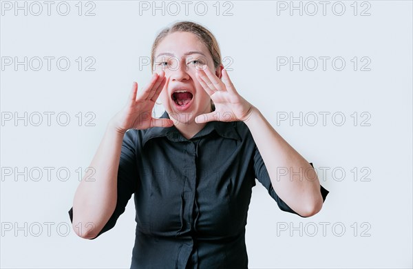 Female teenager announcing something to the camera. Young girl screaming and announcing at the camera